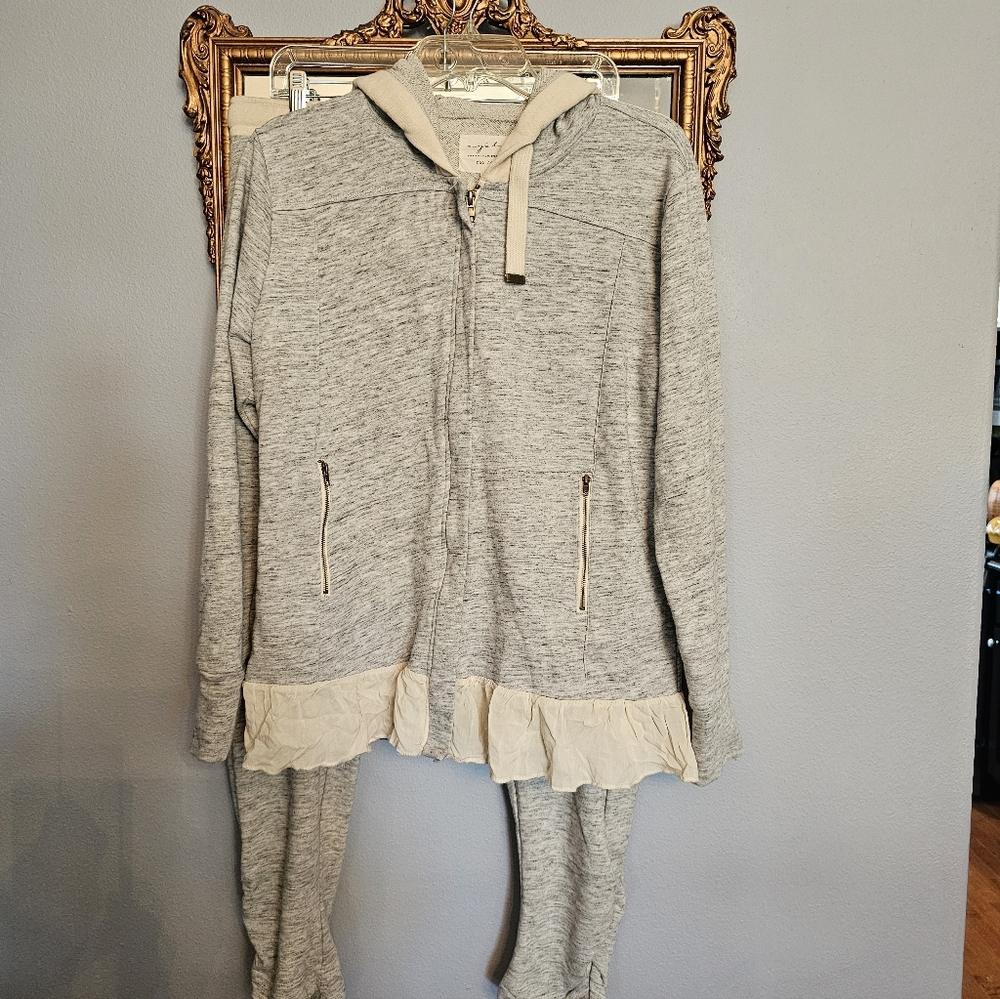 Gray Hooded Zip-Up Jacket with Ruffle Hem. Matching bottoms with tie waist.